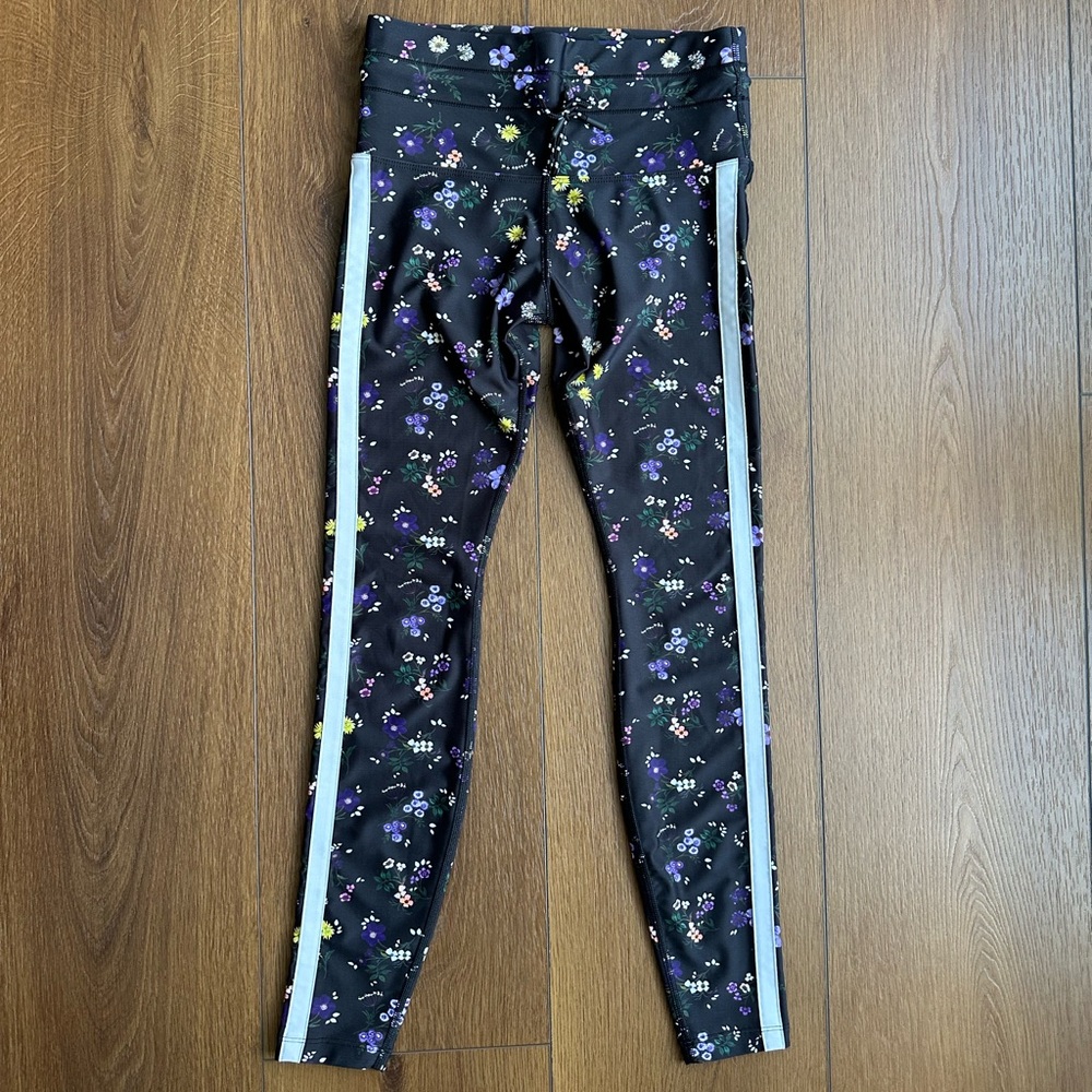 Lorna Jane Black Leggings with white stripe and floral pattern. EUC